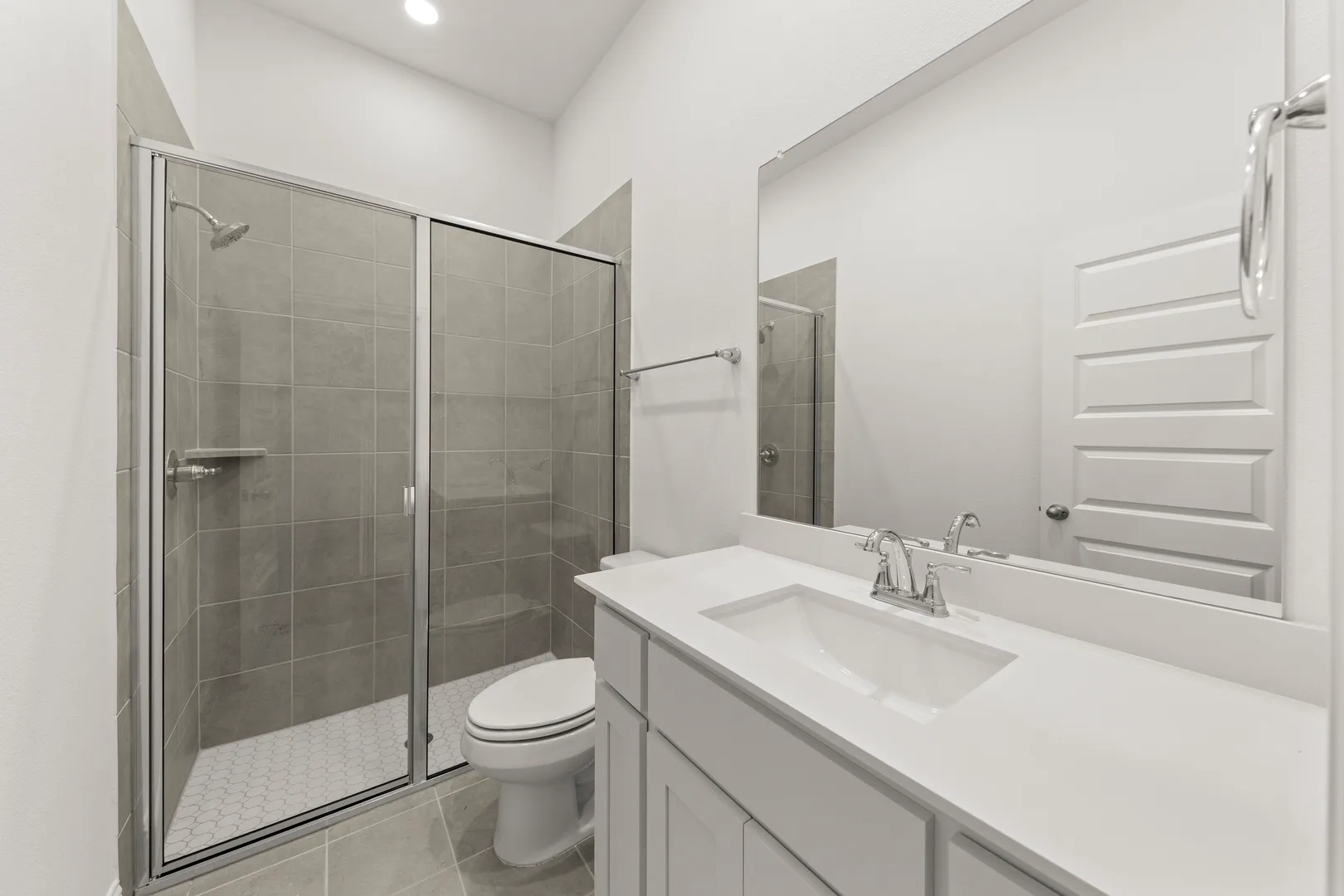 Secondary bathroom in a new home available at Park Trails by Kindred Homes in Forney