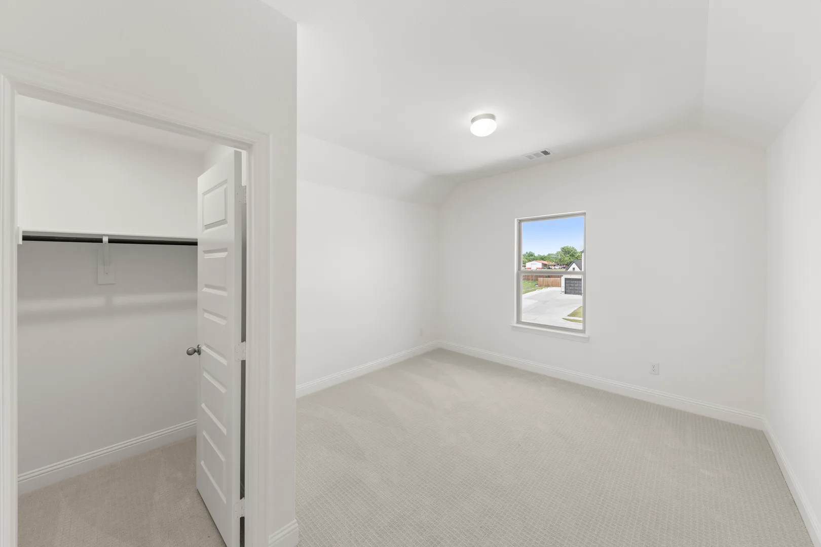 Secondary bedroom in a new home available at Park Trails by Kindred Homes in Forney