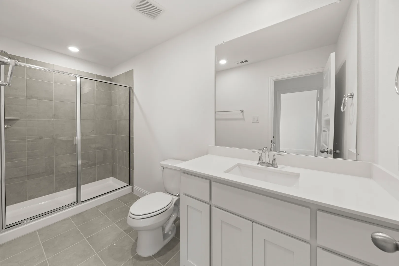 Secondary bathroom in a new home available at Park Trails by Kindred Homes in Forney