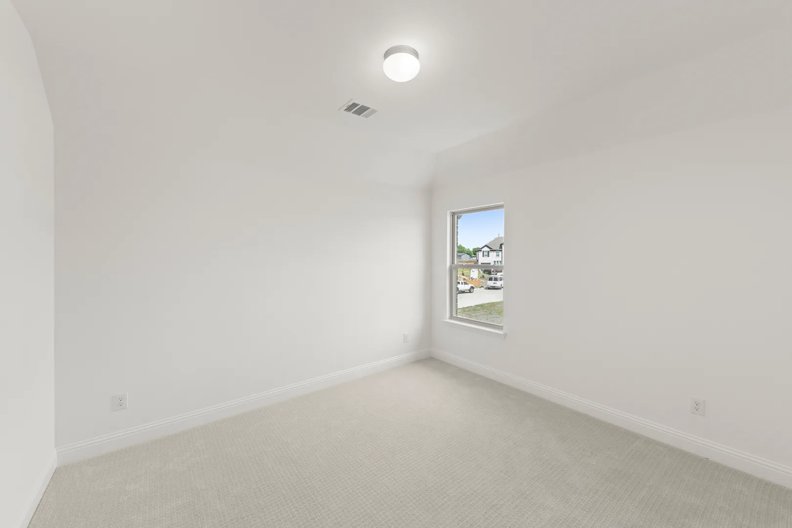 Secondary bedroom in a new home available at Park Trails by Kindred Homes in Forney
