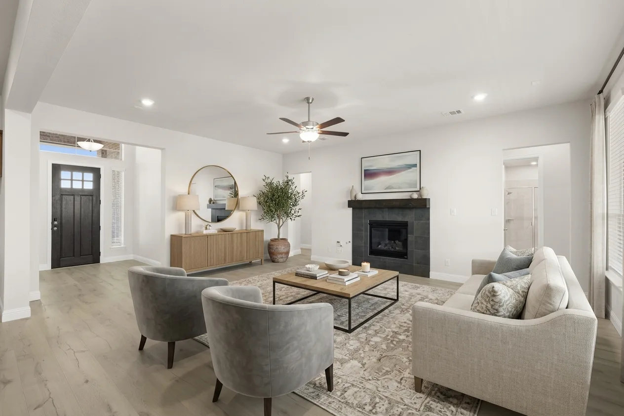 Virtually staged living room in an available home at Heritage by Kindred Homes in McLendon-Chisholm