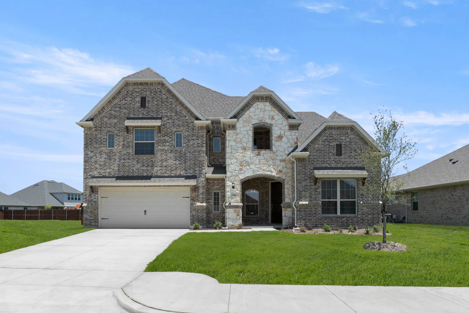 Exterior of a new traditional style home by Kindred Homes