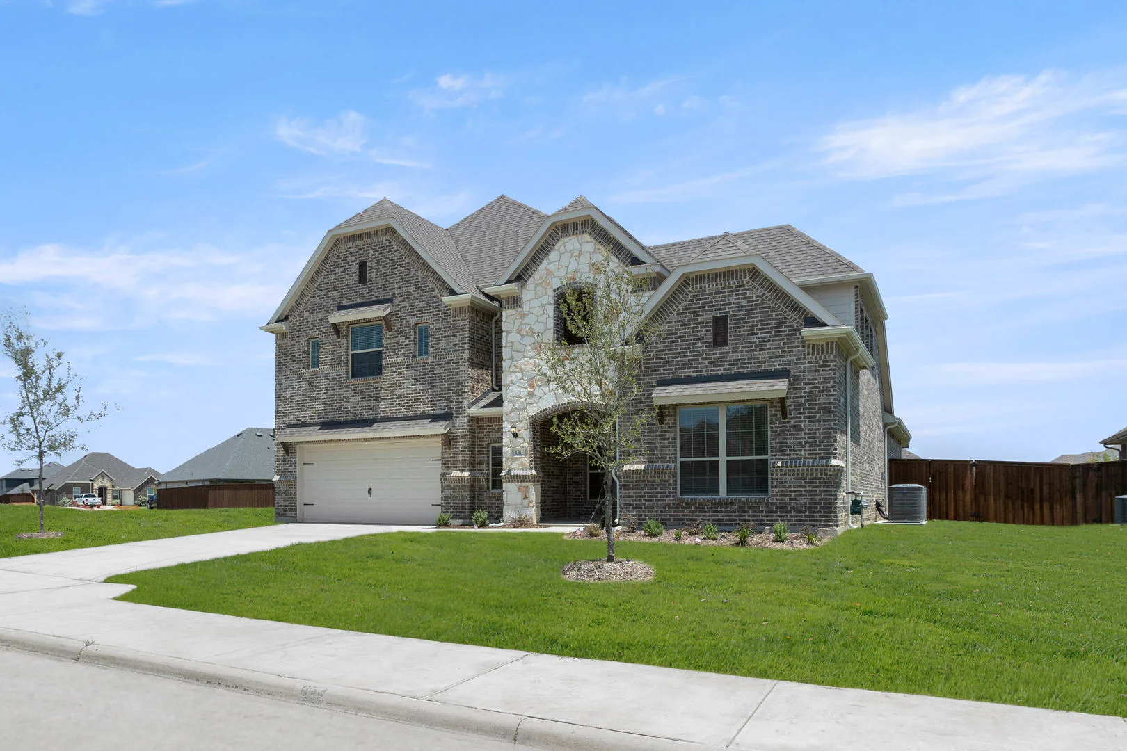 Exterior of a new traditional style home by Kindred Homes