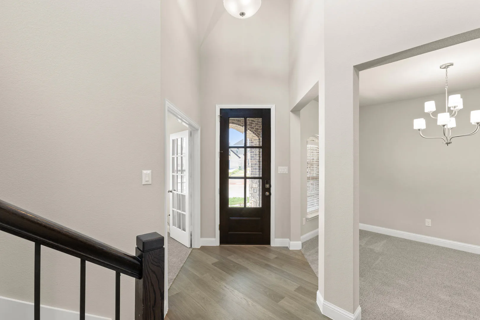 Entryway of a new traditional style home by Kindred Homes