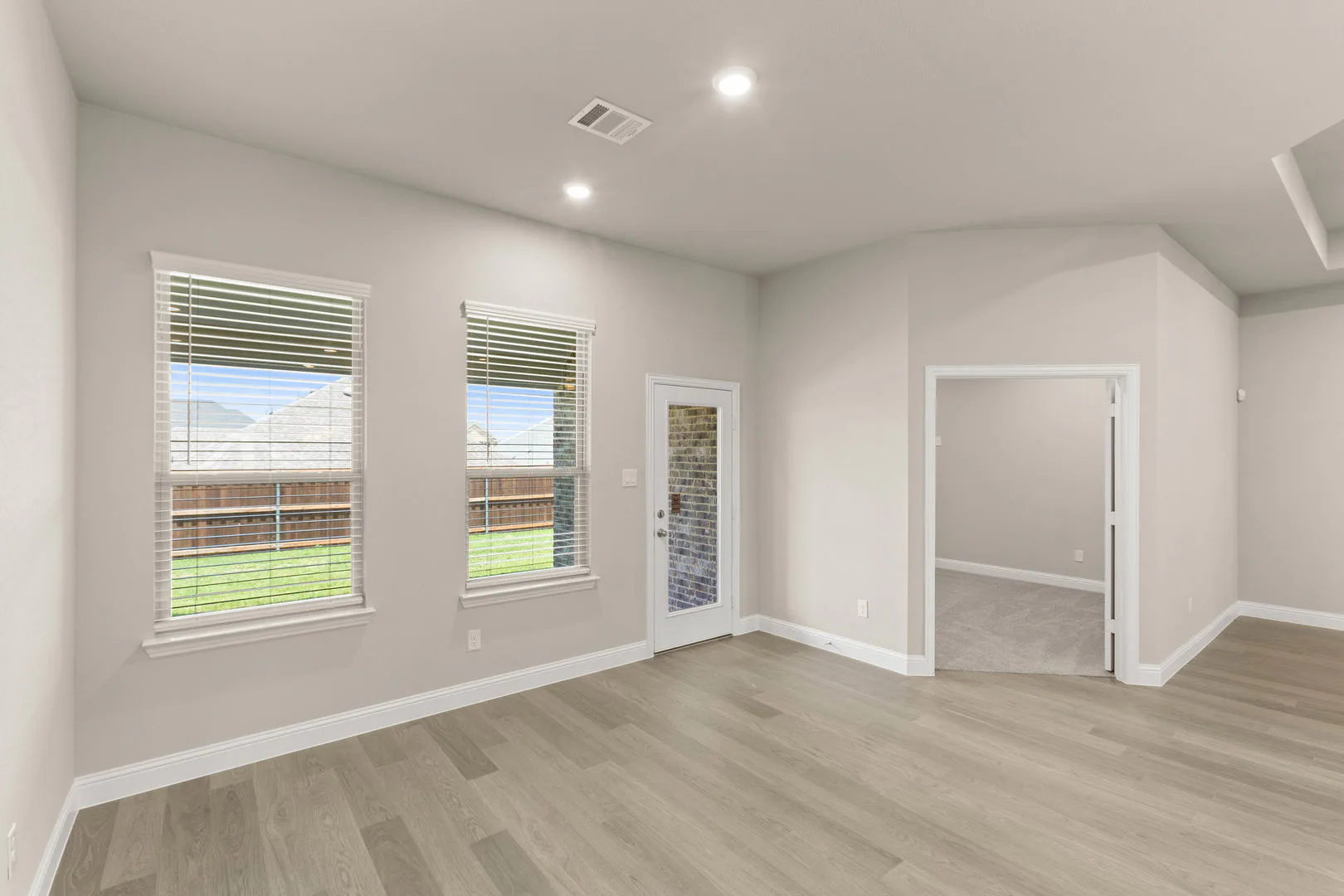 Breakfast nook in a new traditional style home by Kindred Homes