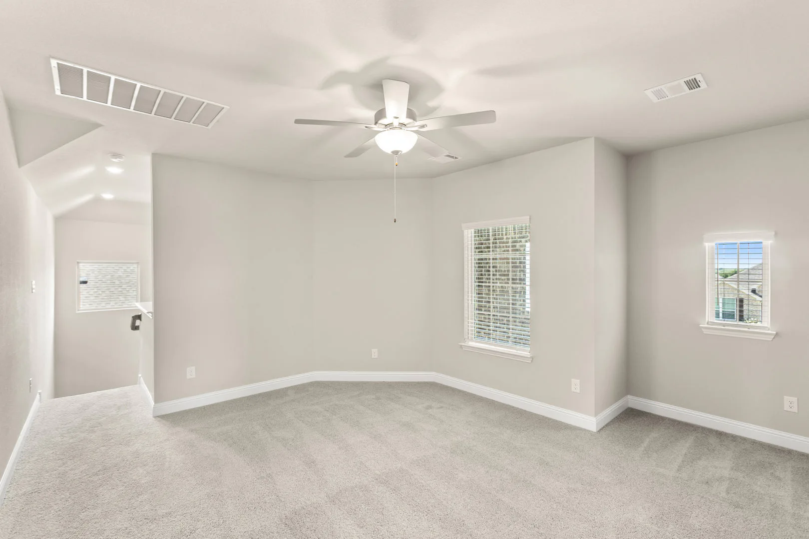 Game room in a new traditional style home by Kindred Homes