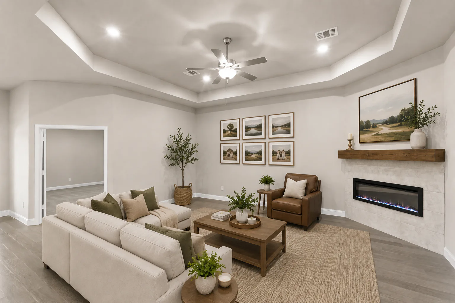 Virtually staged living room in a new traditional style home by Kindred Homes