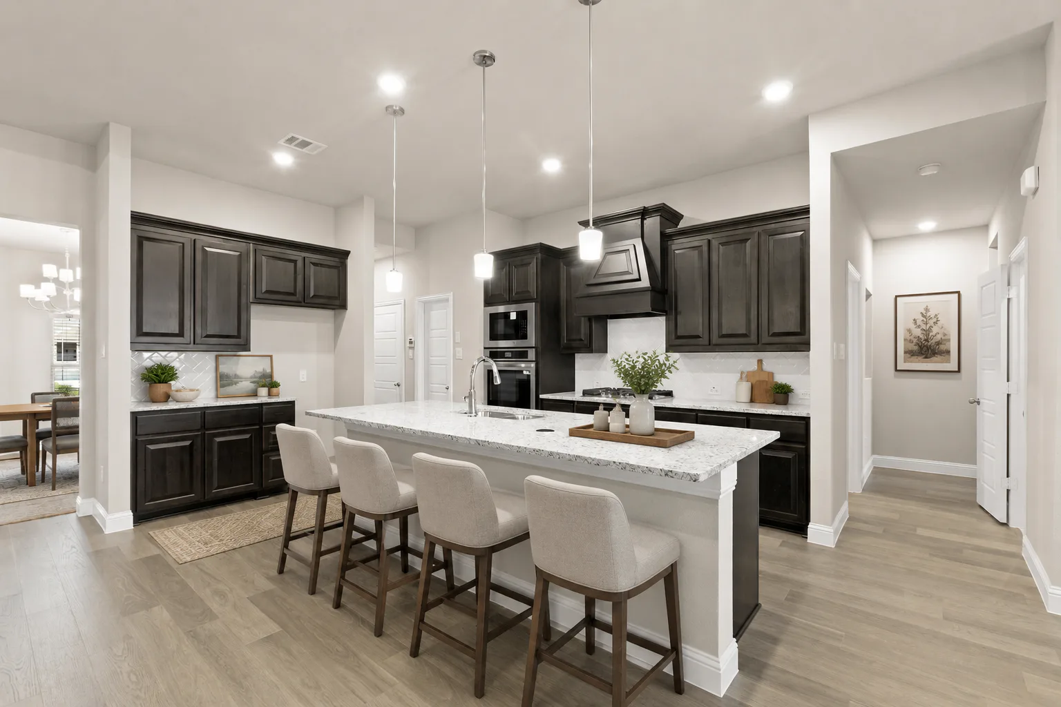 Virtually staged kitchen in a new traditional style home by Kindred Homes