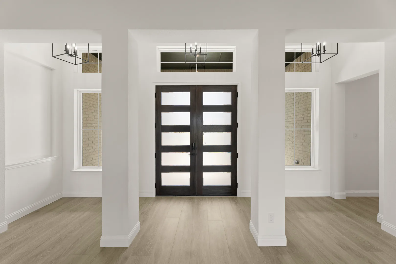 Entry of a transitional ranch style home by Kindred Homes