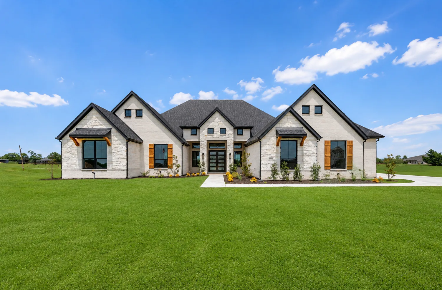 Exterior of a transitional ranch style home by Kindred Homes