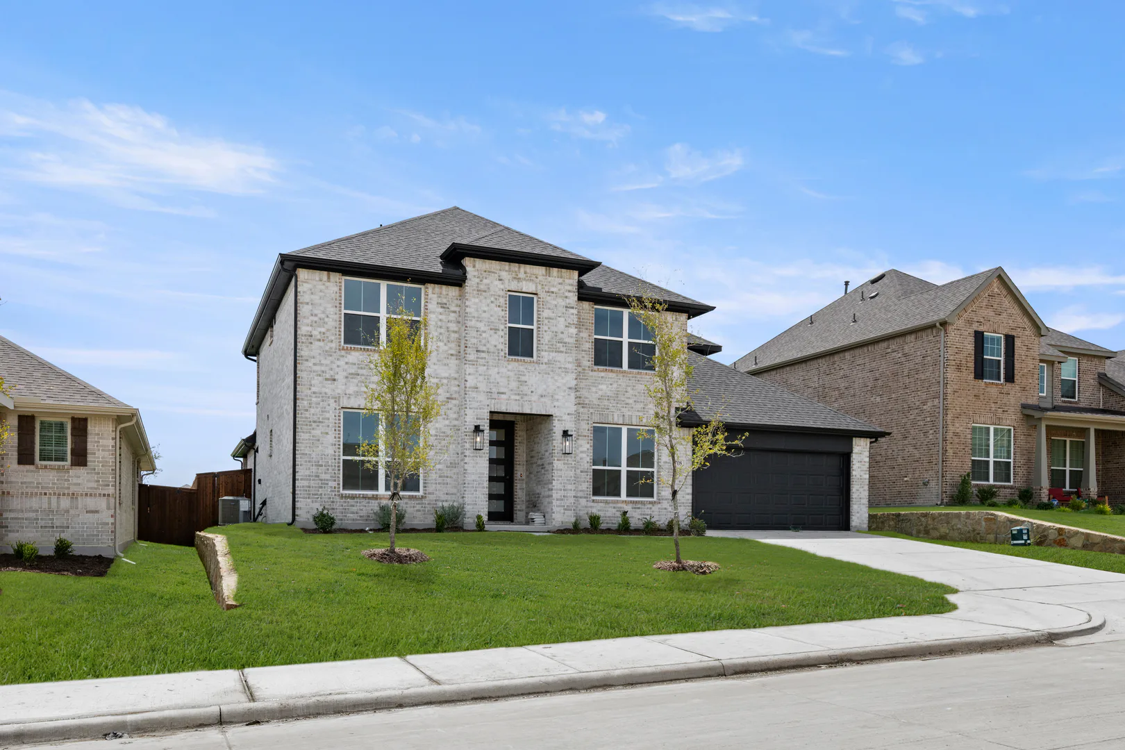 Exterior of a new traditional style home by Kindred Homes
