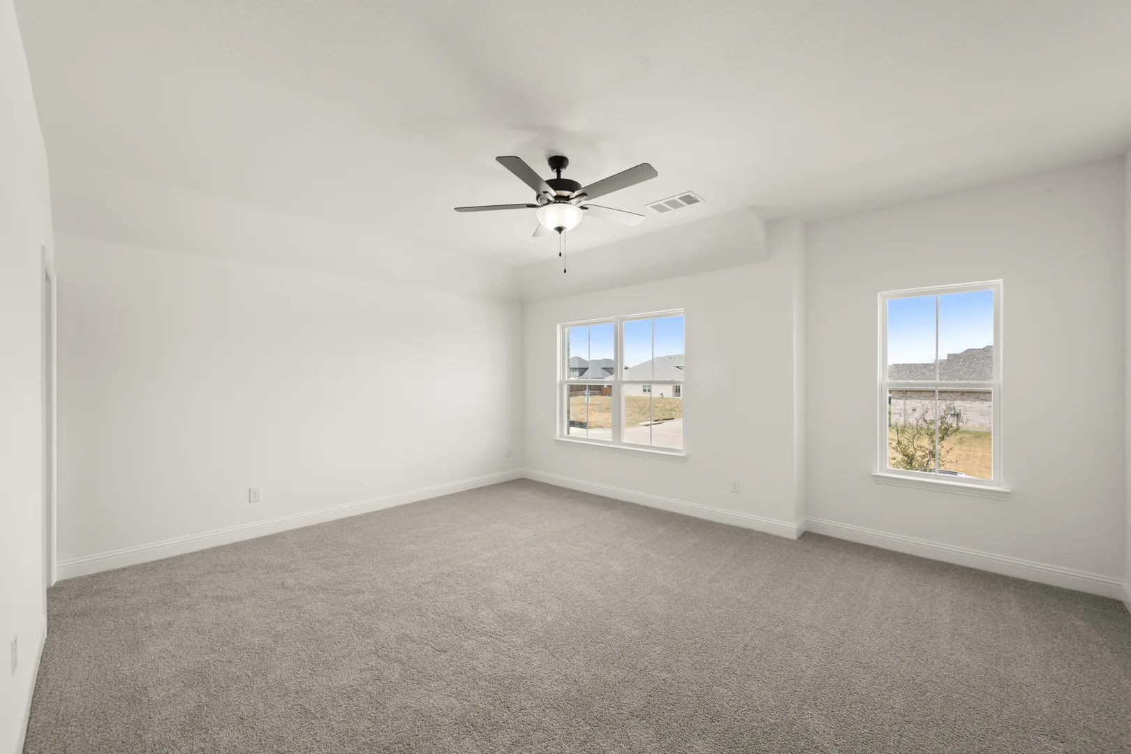 Game room in a new traditional style home by Kindred Homes