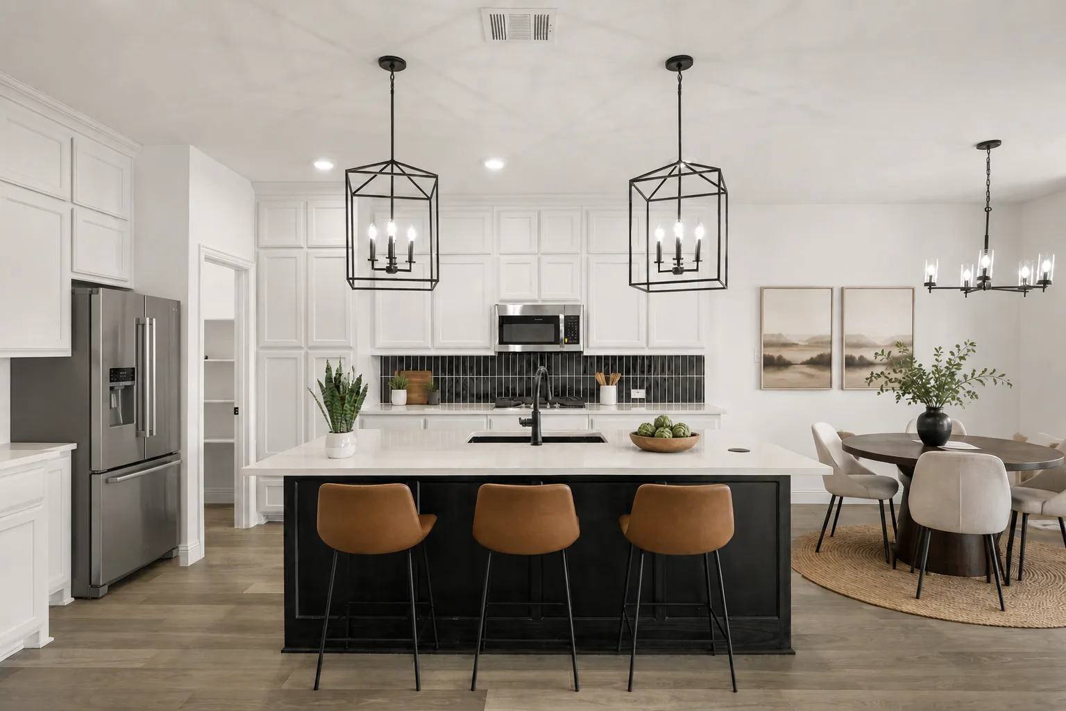 Virtually staged kitchen in a new traditional style home by Kindred Homes