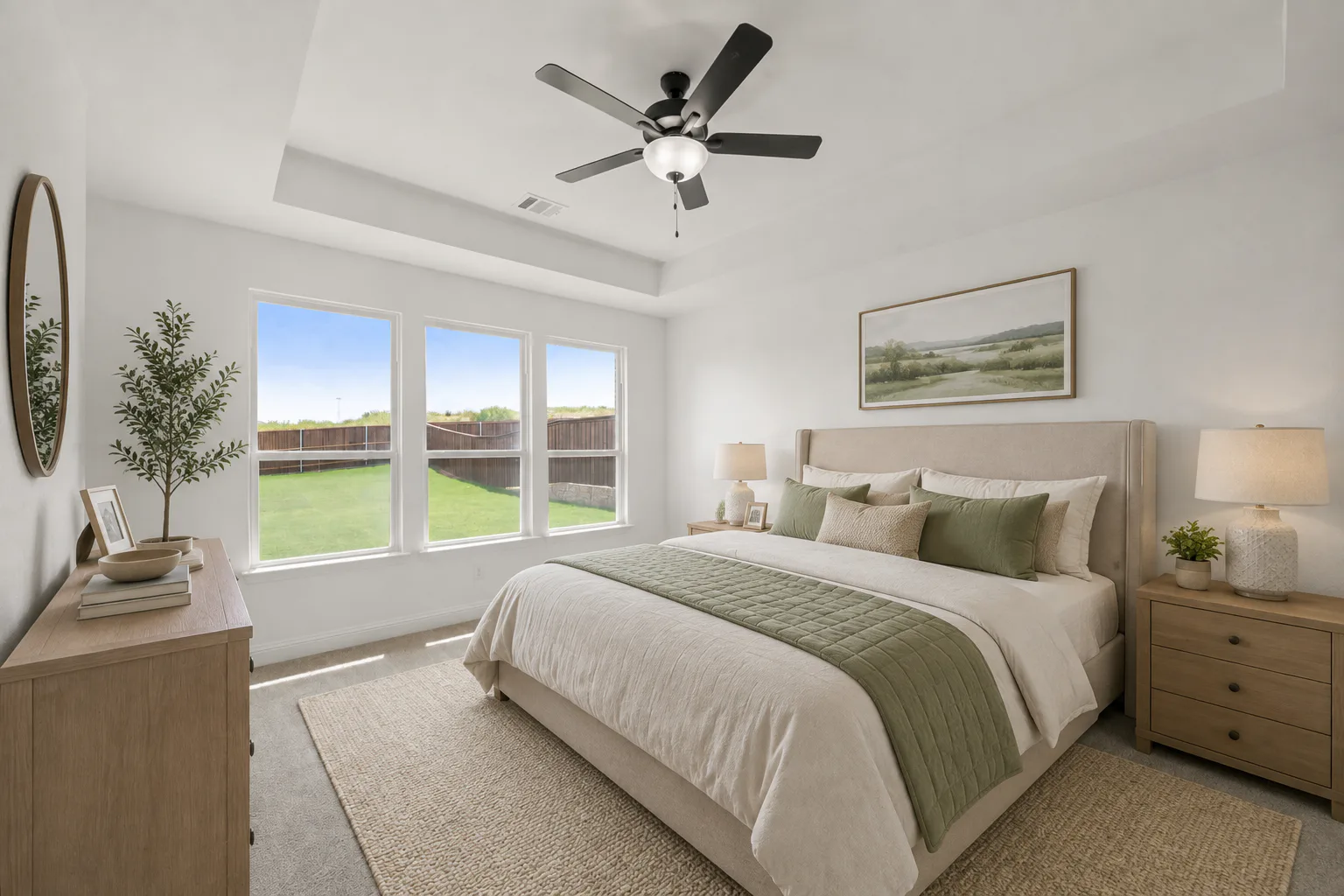 Virtually staged primary bedroom in a new traditional style home by Kindred Homes