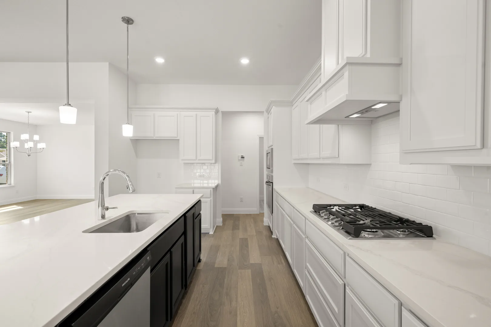 Close up of kitchen in a modern farmhouse transitional style home by Kindred Homes