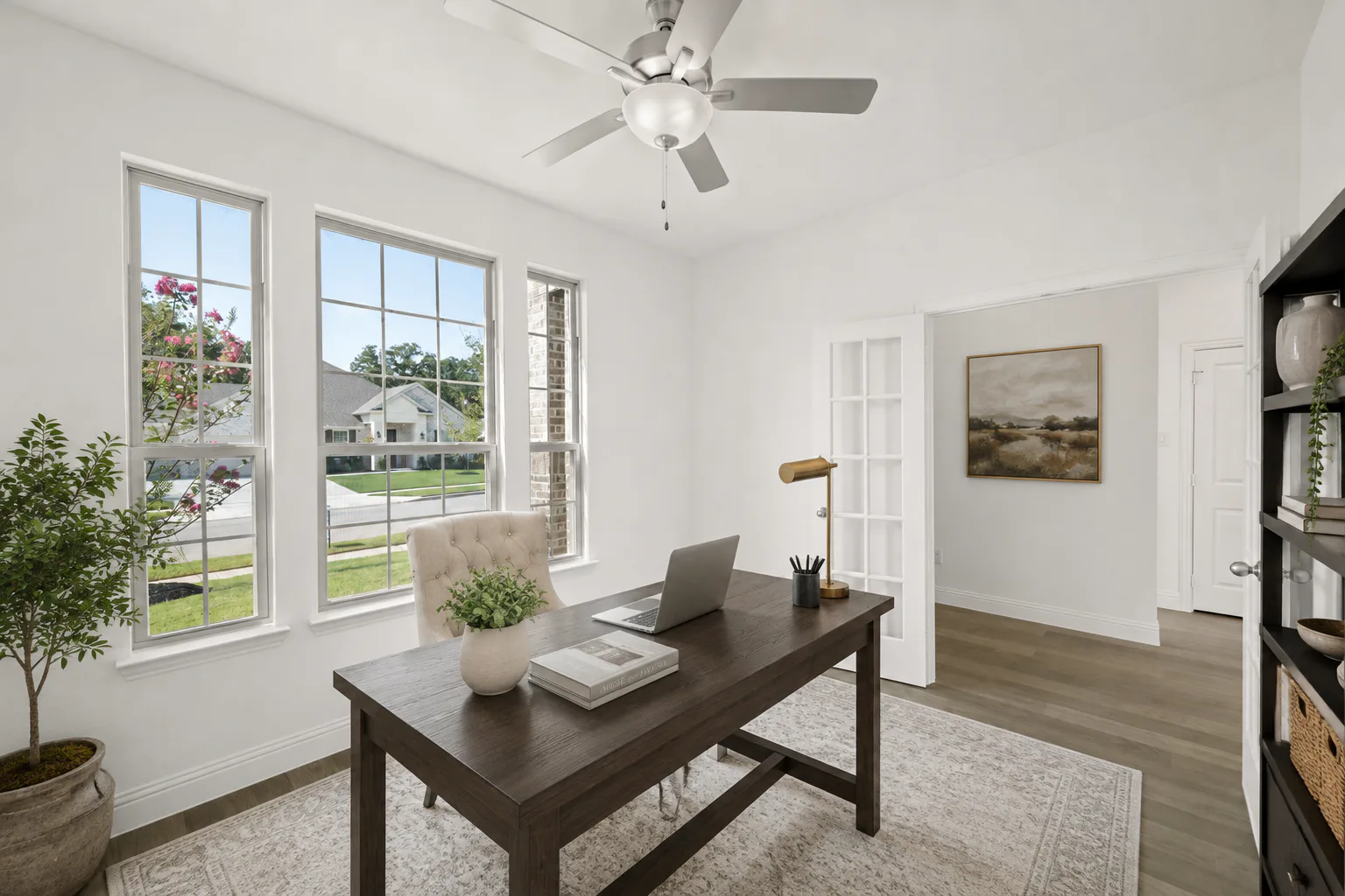 Virtually staged study in a modern farmhouse transitional style home by Kindred Homes