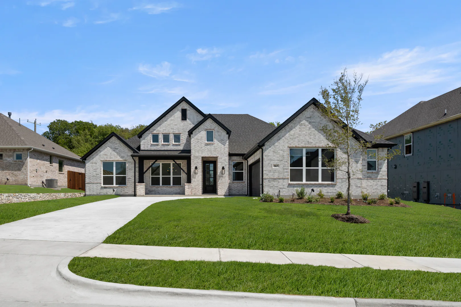 Exterior of a transitional ranch style home by Kindred Homes