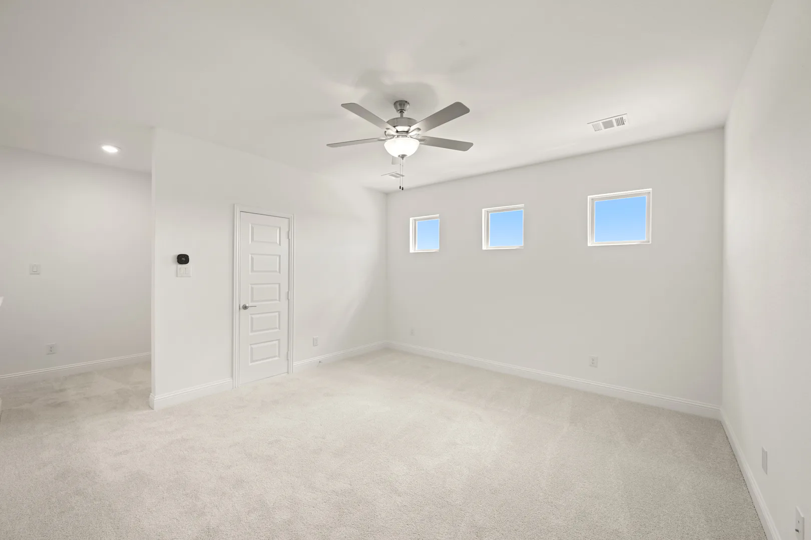 Game room in a modern Texas ranch style home by Kindred Homes