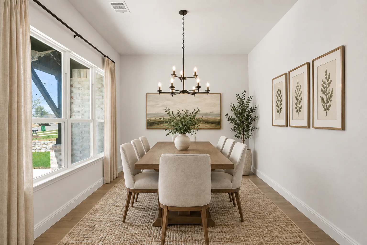 Virtually staged dining room in a new traditional style home by Kindred Homes
