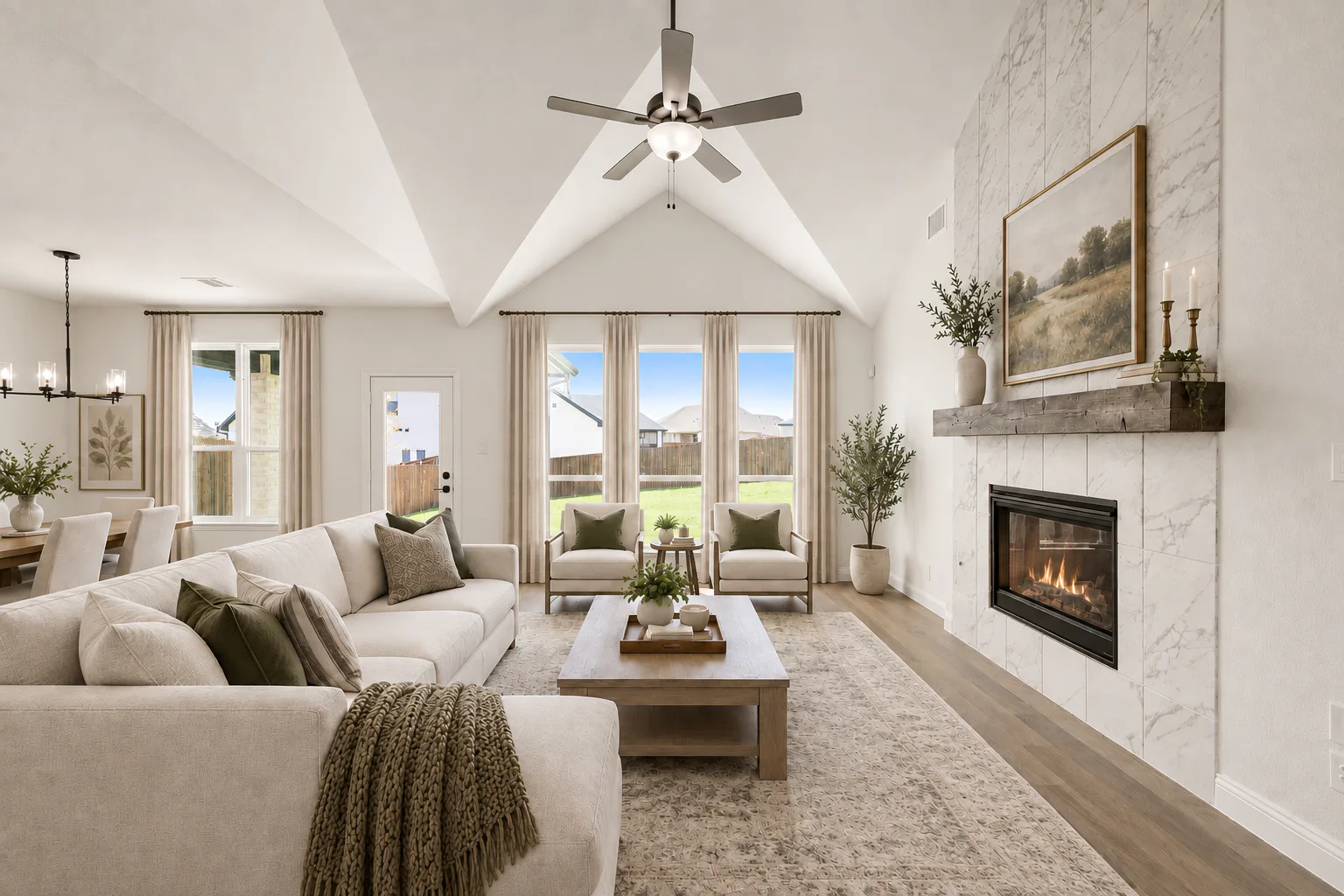Virtually staged living room in a new traditional style home by Kindred Homes