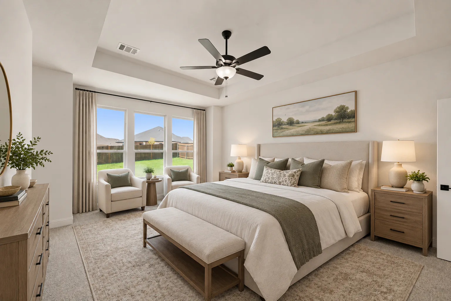 Virtually staged primary bedroom in a new traditional style home by Kindred Homes