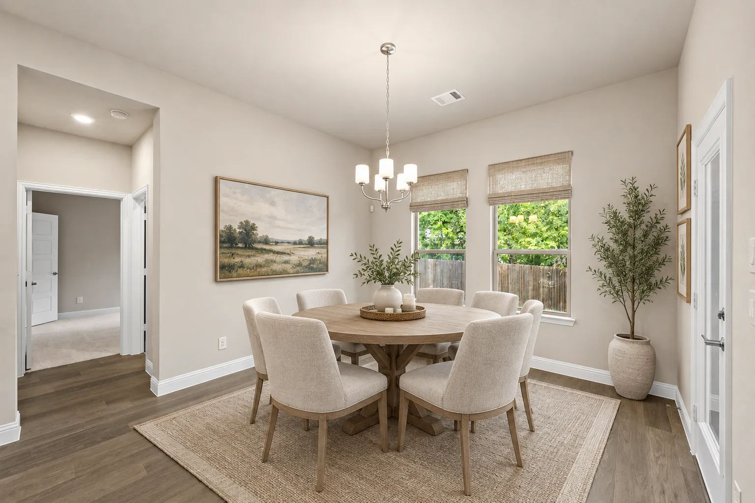 Virtually staged breakfast nook in a transitional ranch style home by Kindred Homes