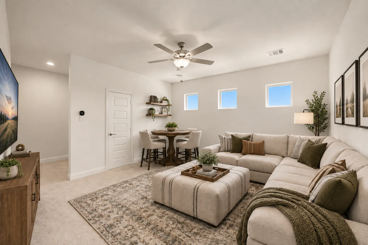 Virtually staged game room in a modern Texas ranch style home by Kindred Homes