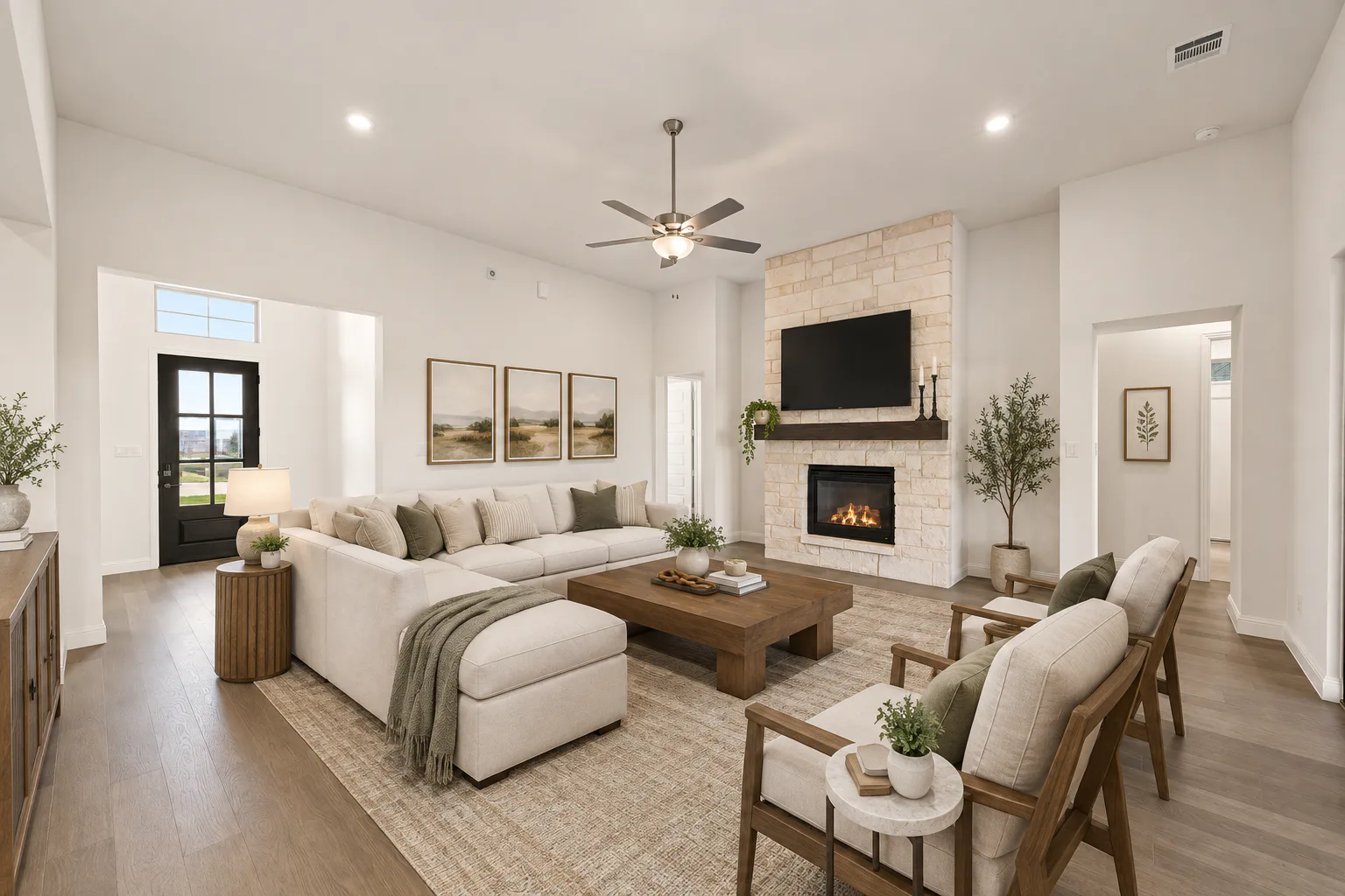Virtually staged living room in a modern Texas ranch style home by Kindred Homes