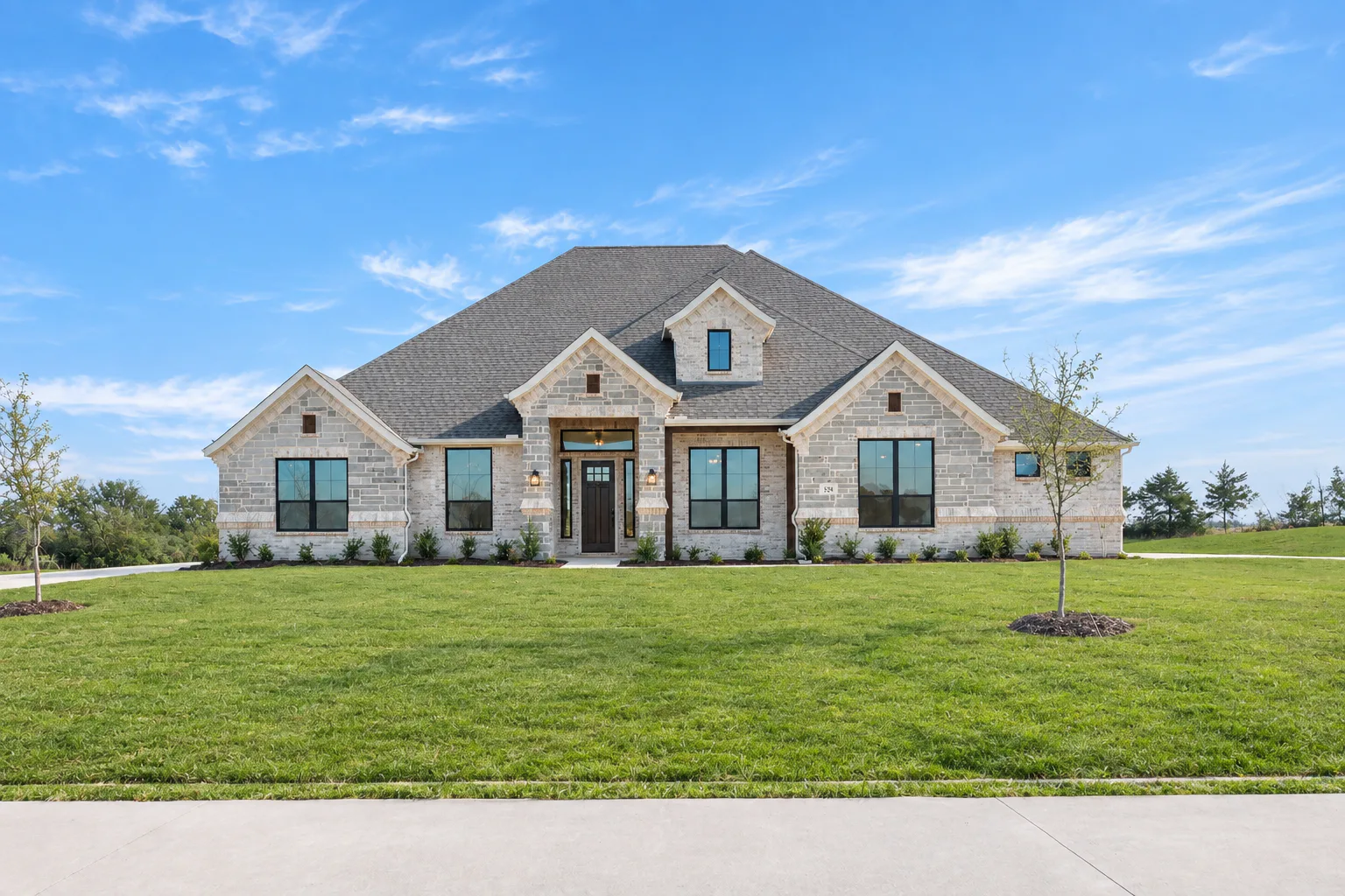 Exterior of an available home at Heritage by Kindred Homes in McLendon-Chisholm