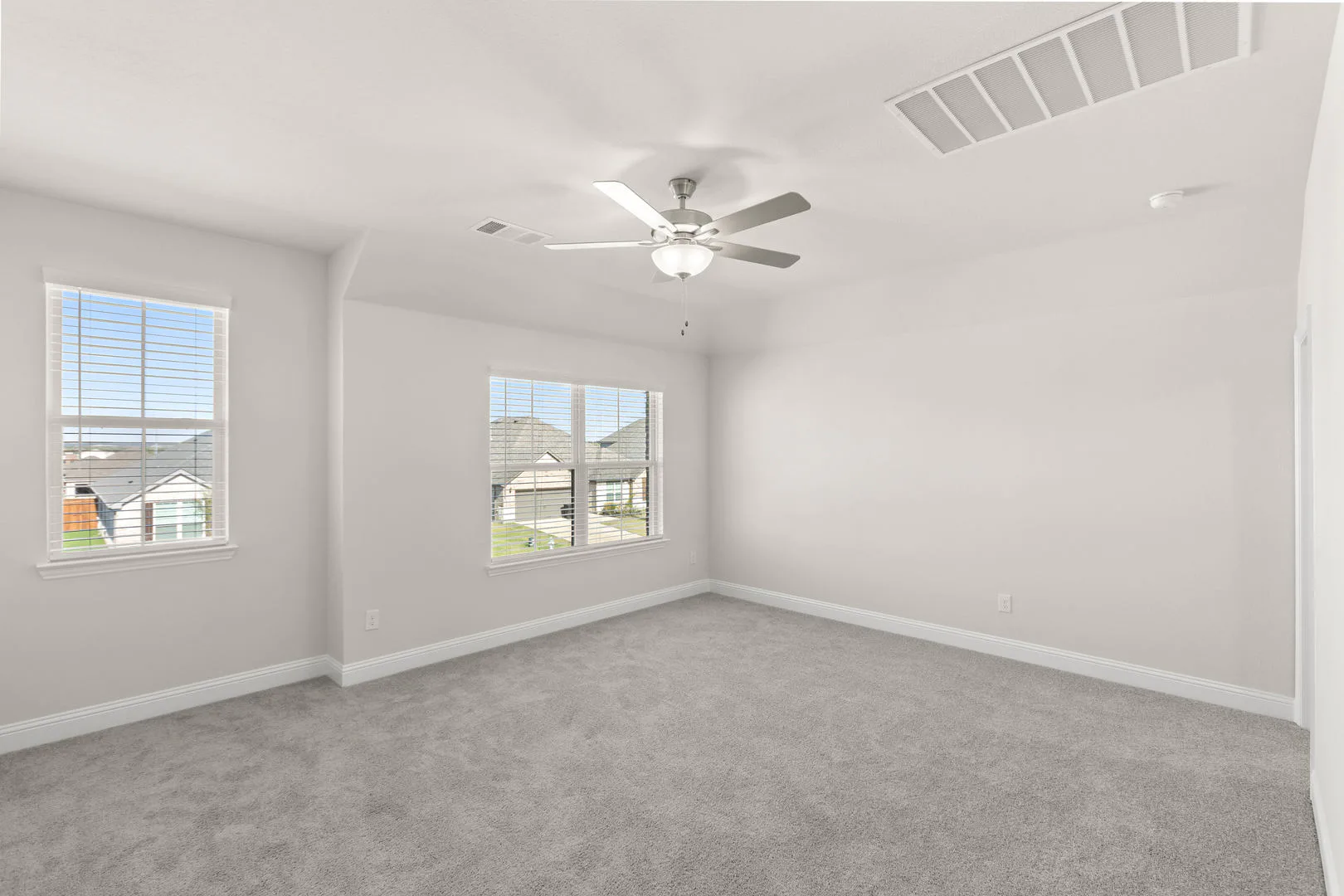 Game room in a new traditional style home by Kindred Homes